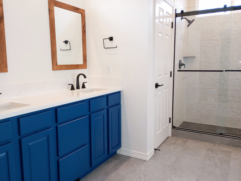 Custom cabinets and tile installation in a bathroom remodel in Boise, Idaho by Total Home Services.