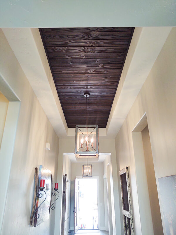 Custom ceiling beams in entry of home in Meridian, Idaho by Total Home Services.